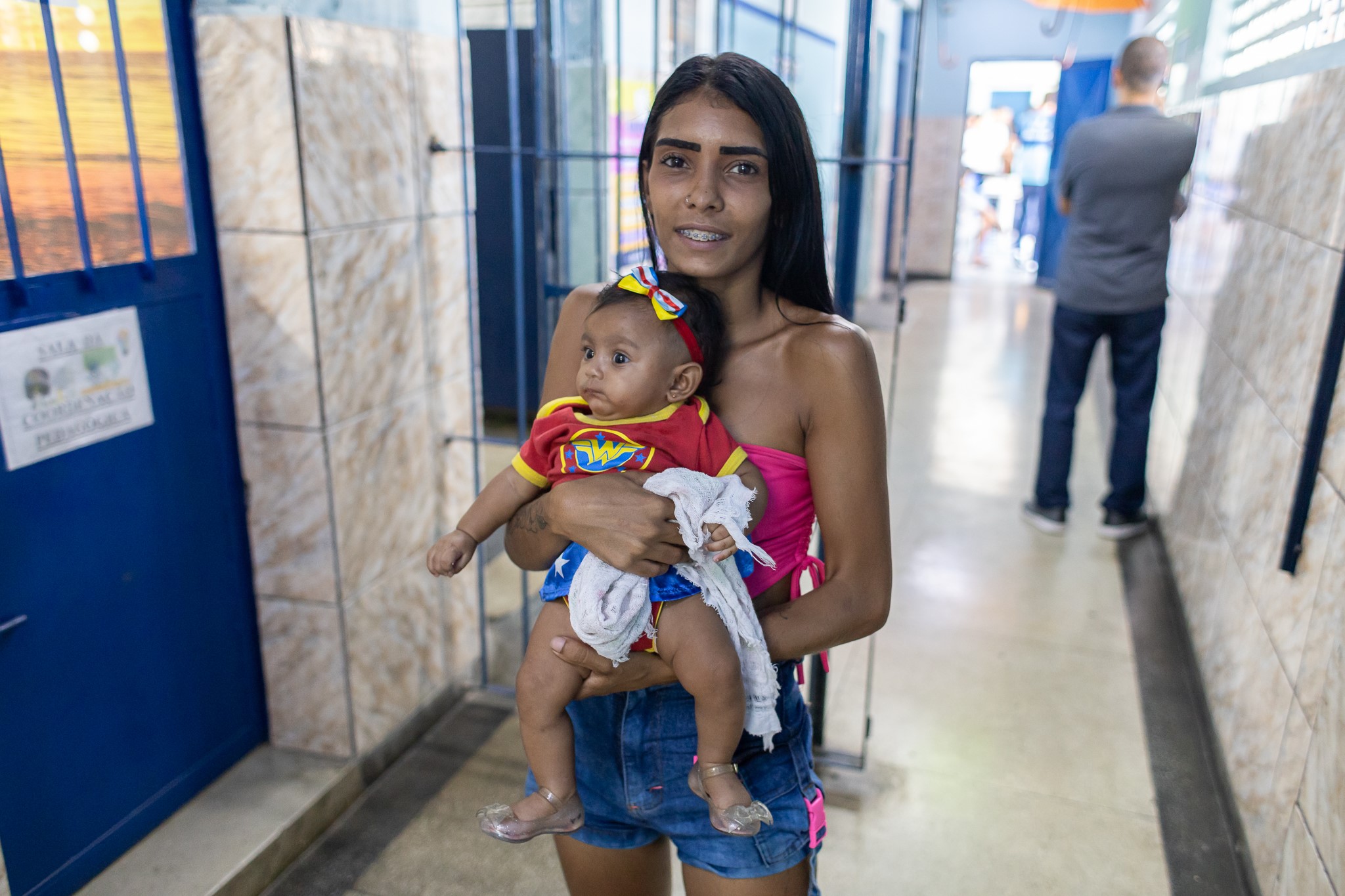  Raiane de Oliveira Meira, de 24 anos, levou a filha de quatro meses para fazer o registro de nascimento durante a Justiça Itinerante em Jardim Gramacho